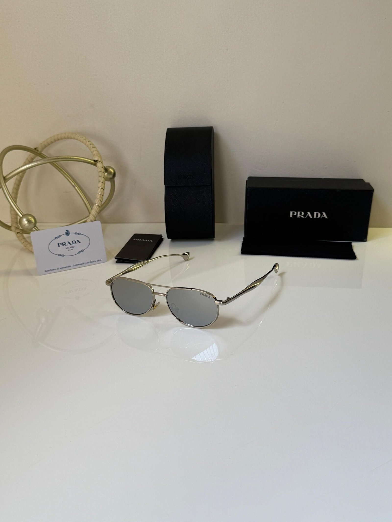 Prada 149 Silver Sunglasses – Sleek Designer Eyewear
